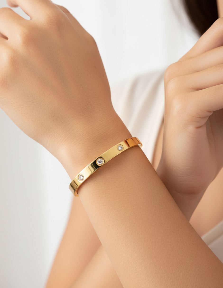 Brazalete de oro laminado con zirconias