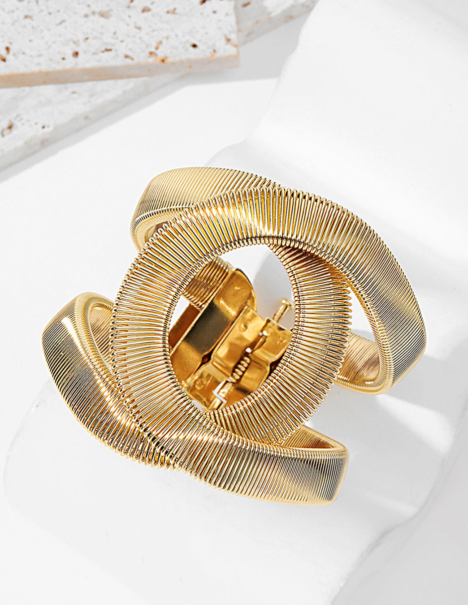 Brazalete rígido de oro laminado con diseño de espiral