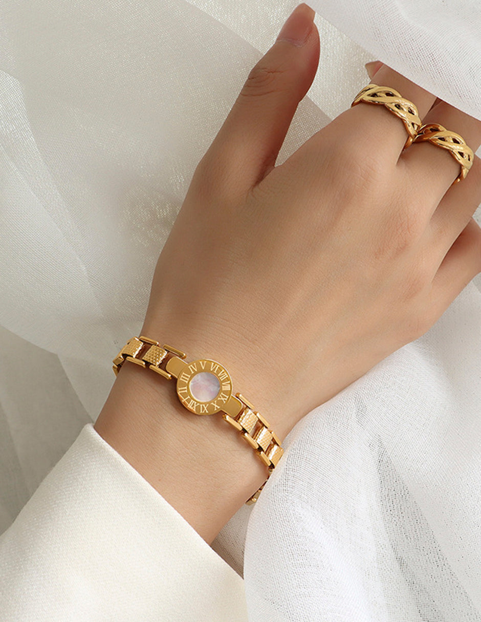 Pulsera de oro laminado eslabones tipo reloj y números romanos