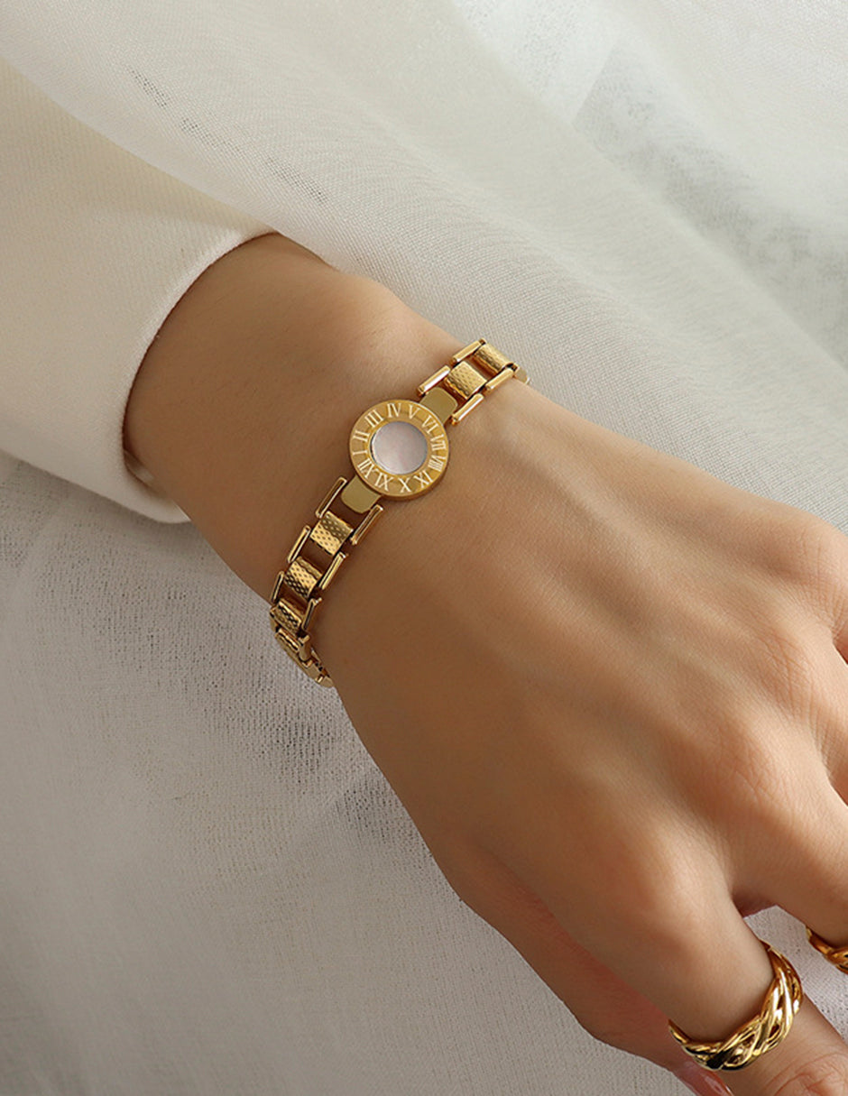 Pulsera de oro laminado eslabones tipo reloj y números romanos