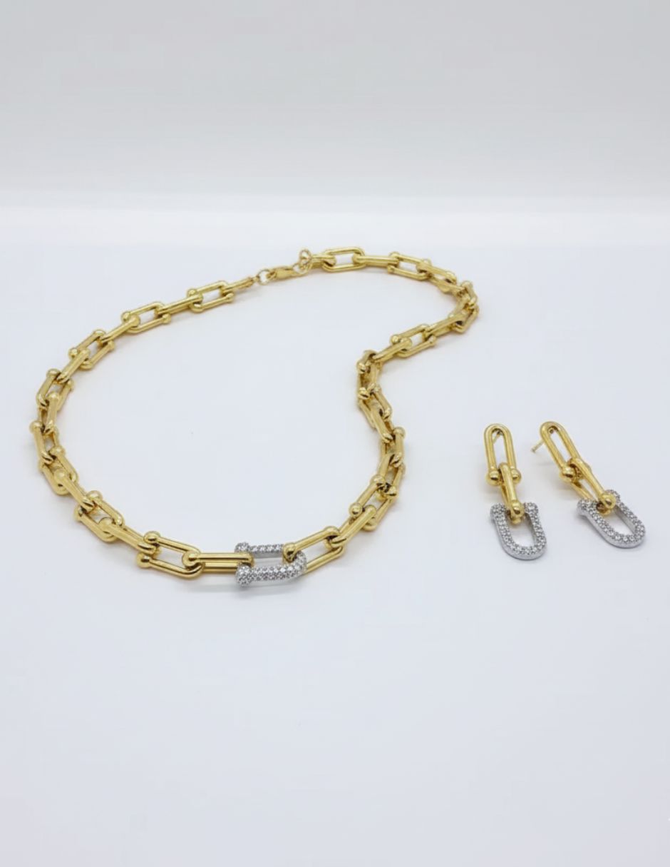 Juego de pulsera y aretes de oro laminado con brillos