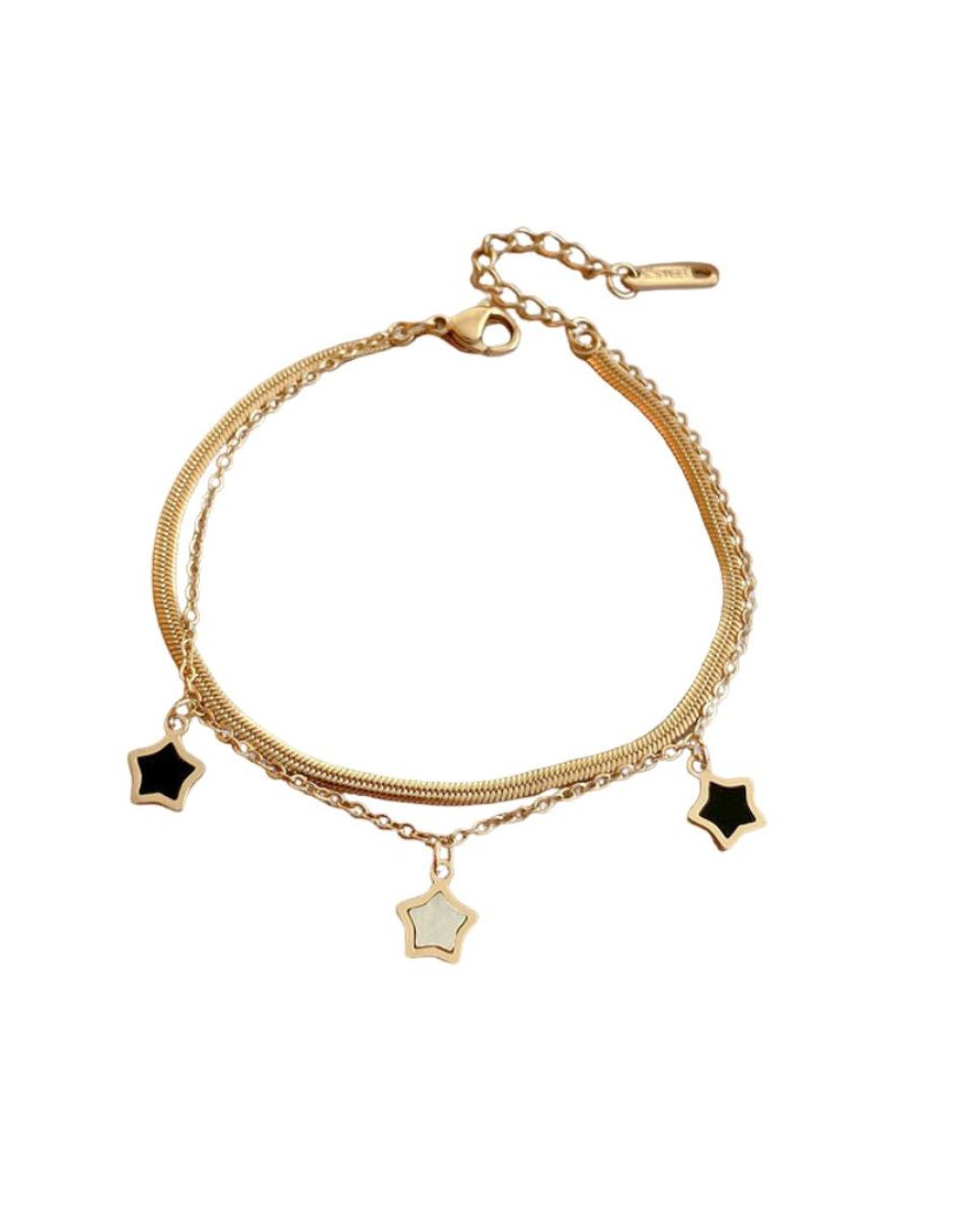 Pulsera de oro laminado con estrellas negras con blanco