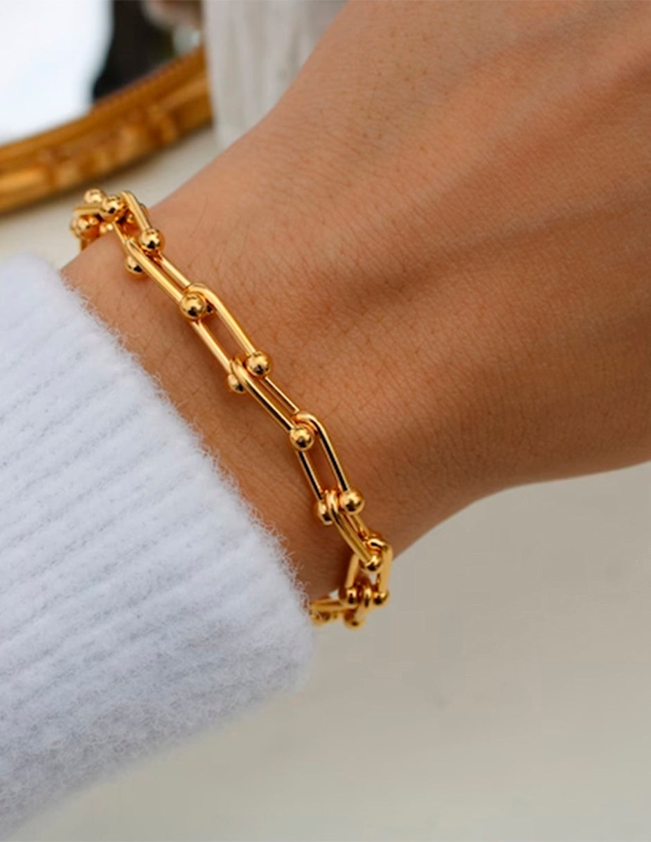 Pulsera de oro laminado en forma de U